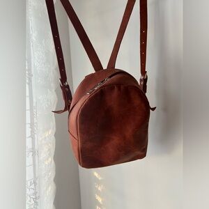 Brown leather backpack